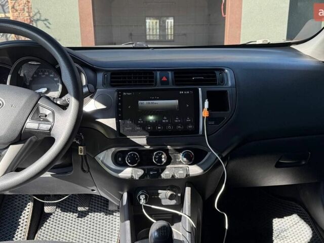 Сірий Кіа Ріо, об'ємом двигуна 1.12 л та пробігом 220 тис. км за 5700 $, фото 4 на Automoto.ua