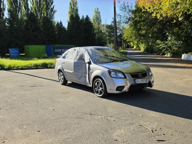 Сірий Кіа Ріо, об'ємом двигуна 1.4 л та пробігом 56 тис. км за 1253 $, фото 1 на Automoto.ua