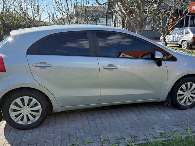 Сірий Кіа Ріо, об'ємом двигуна 1.12 л та пробігом 220 тис. км за 5700 $, фото 2 на Automoto.ua