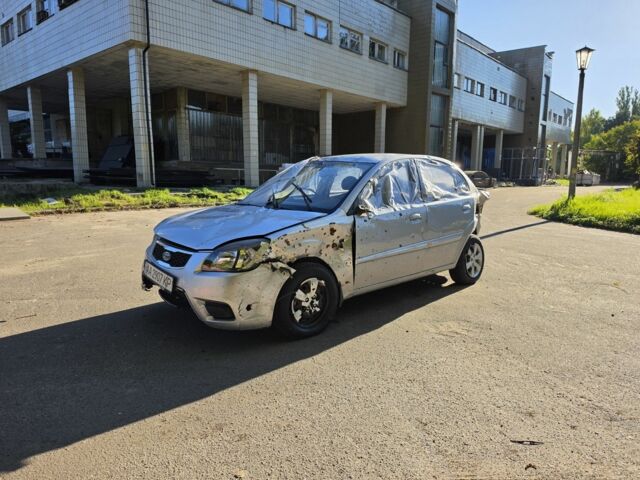 Сірий Кіа Ріо, об'ємом двигуна 1.4 л та пробігом 56 тис. км за 1253 $, фото 7 на Automoto.ua
