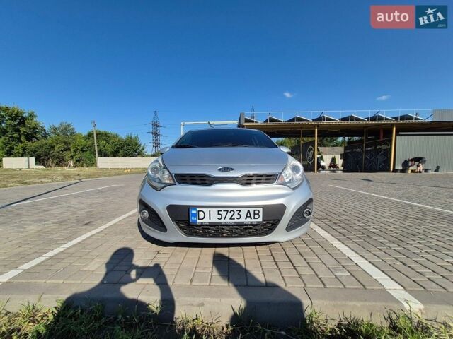 Серый Киа Рио, объемом двигателя 1.4 л и пробегом 254 тыс. км за 6500 $, фото 1 на Automoto.ua