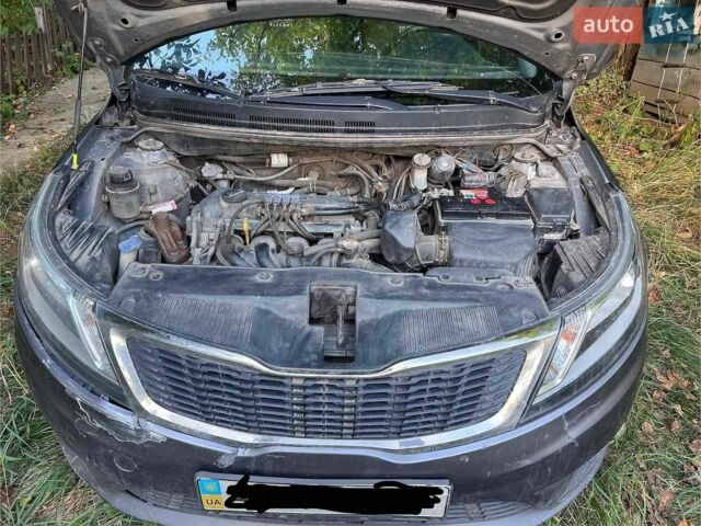 Серый Киа Рио, объемом двигателя 1.4 л и пробегом 205 тыс. км за 5400 $, фото 2 на Automoto.ua