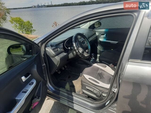 Серый Киа Рио, объемом двигателя 1.4 л и пробегом 198 тыс. км за 6700 $, фото 9 на Automoto.ua