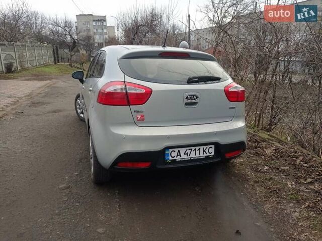 Серый Киа Рио, объемом двигателя 1.12 л и пробегом 212 тыс. км за 5900 $, фото 2 на Automoto.ua