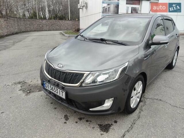 Серый Киа Рио, объемом двигателя 1.59 л и пробегом 230 тыс. км за 7500 $, фото 4 на Automoto.ua