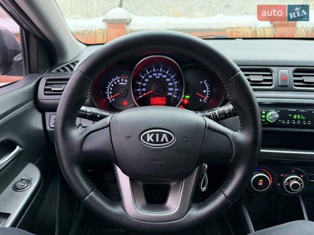 Сірий Кіа Ріо, об'ємом двигуна 1.4 л та пробігом 177 тис. км за 5450 $, фото 9 на Automoto.ua