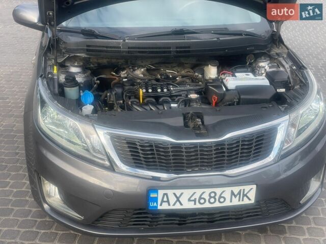 Сірий Кіа Ріо, об'ємом двигуна 1.4 л та пробігом 177 тис. км за 6700 $, фото 12 на Automoto.ua