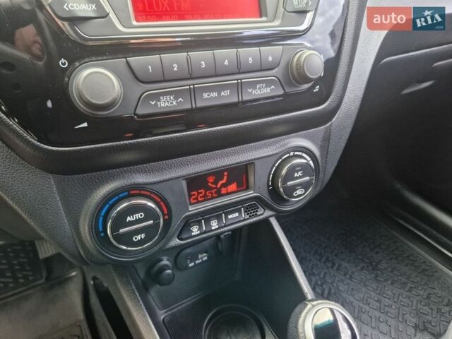 Серый Киа Рио, объемом двигателя 1.6 л и пробегом 98 тыс. км за 9400 $, фото 46 на Automoto.ua