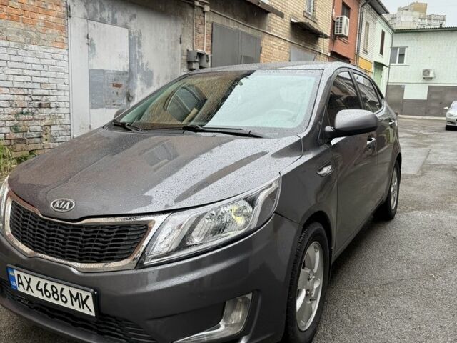 Серый Киа Рио, объемом двигателя 1.4 л и пробегом 170 тыс. км за 6850 $, фото 3 на Automoto.ua