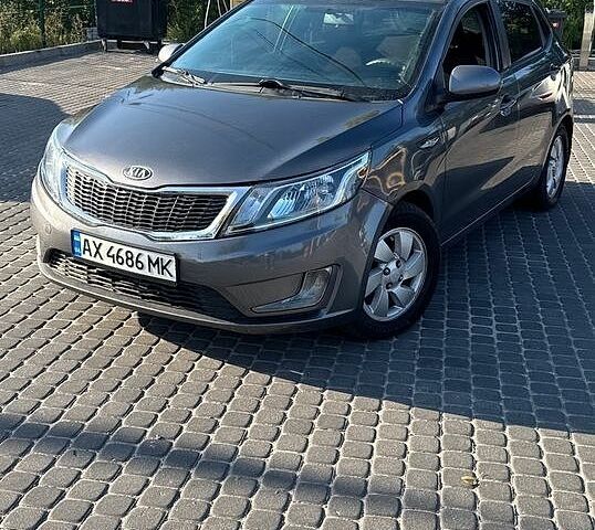 Серый Киа Рио, объемом двигателя 1.4 л и пробегом 177 тыс. км за 6777 $, фото 2 на Automoto.ua