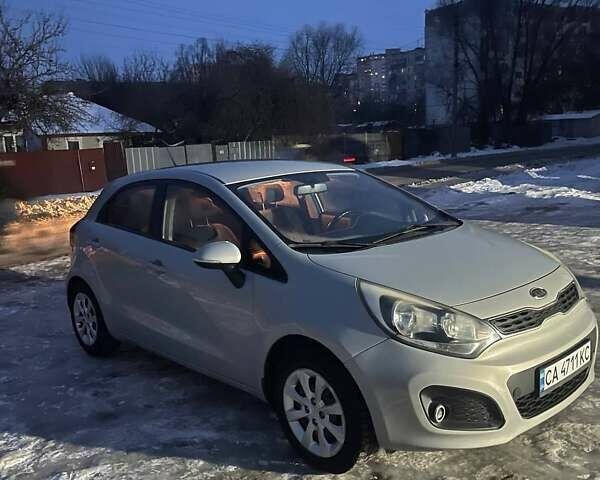 Серый Киа Рио, объемом двигателя 1.12 л и пробегом 220 тыс. км за 5750 $, фото 1 на Automoto.ua