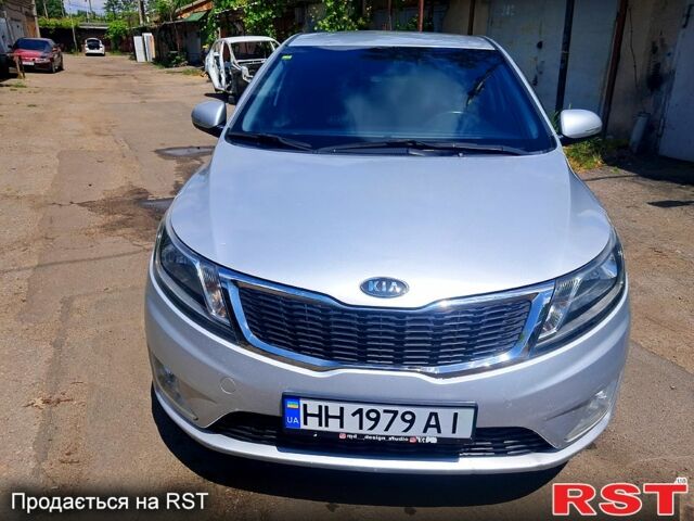 Серый Киа Рио, объемом двигателя 1.6 л и пробегом 240 тыс. км за 7400 $, фото 2 на Automoto.ua