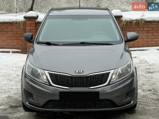 Сірий Кіа Ріо, об'ємом двигуна 1.4 л та пробігом 177 тис. км за 5450 $, фото 1 на Automoto.ua