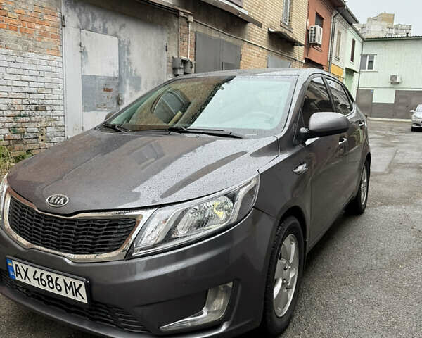 Сірий Кіа Ріо, об'ємом двигуна 1.4 л та пробігом 170 тис. км за 5999 $, фото 2 на Automoto.ua