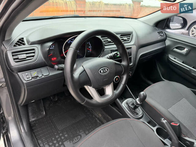 Сірий Кіа Ріо, об'ємом двигуна 1.4 л та пробігом 177 тис. км за 5450 $, фото 7 на Automoto.ua