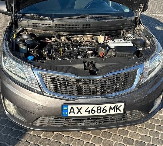 Серый Киа Рио, объемом двигателя 1.4 л и пробегом 177 тыс. км за 6777 $, фото 11 на Automoto.ua