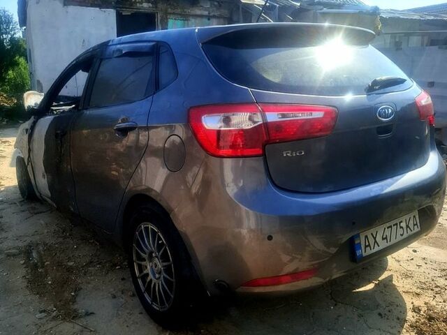 Серый Киа Рио, объемом двигателя 1.6 л и пробегом 125 тыс. км за 1750 $, фото 1 на Automoto.ua