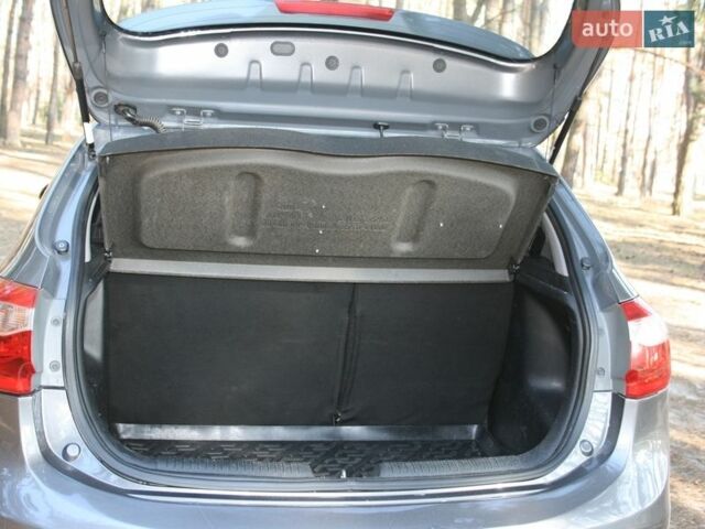 Сірий Кіа Ріо, об'ємом двигуна 1.4 л та пробігом 116 тис. км за 6500 $, фото 7 на Automoto.ua