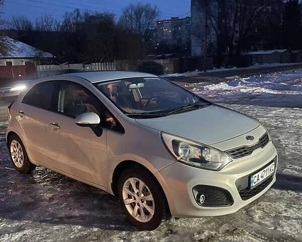 Серый Киа Рио, объемом двигателя 1.12 л и пробегом 220 тыс. км за 5750 $, фото 3 на Automoto.ua