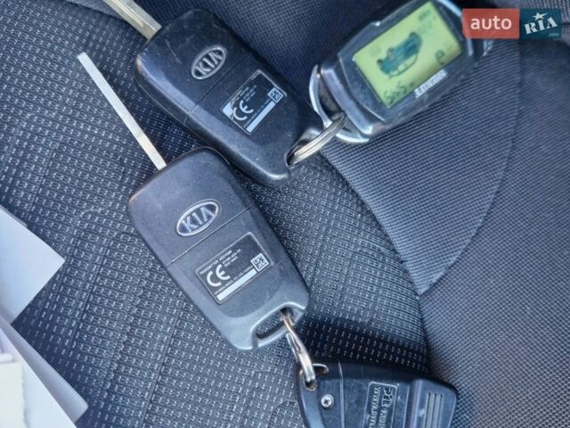 Серый Киа Рио, объемом двигателя 1.6 л и пробегом 98 тыс. км за 9400 $, фото 78 на Automoto.ua