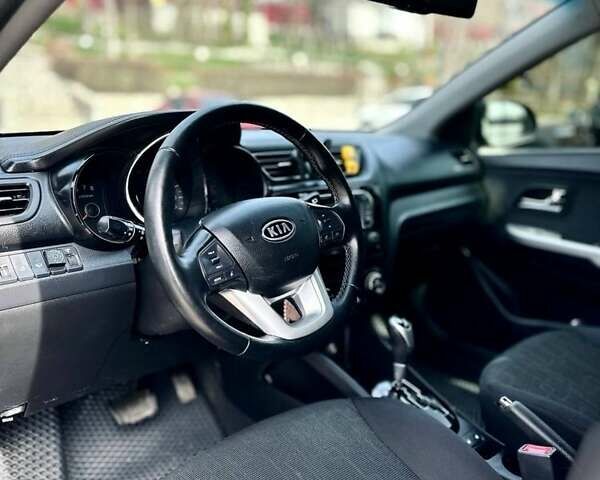Серый Киа Рио, объемом двигателя 1.6 л и пробегом 150 тыс. км за 8500 $, фото 12 на Automoto.ua