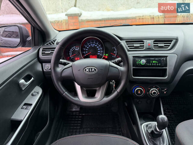 Сірий Кіа Ріо, об'ємом двигуна 1.4 л та пробігом 177 тис. км за 5450 $, фото 8 на Automoto.ua
