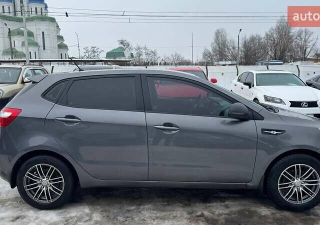 Серый Киа Рио, объемом двигателя 1.4 л и пробегом 178 тыс. км за 6350 $, фото 2 на Automoto.ua