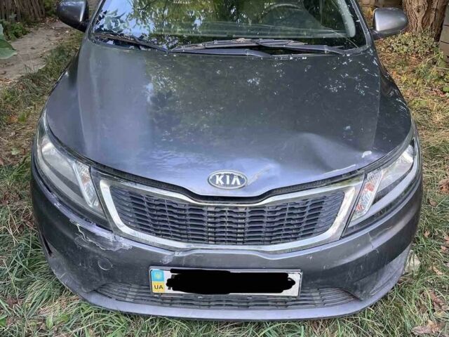 Серый Киа Рио, объемом двигателя 1.4 л и пробегом 205 тыс. км за 4112 $, фото 2 на Automoto.ua