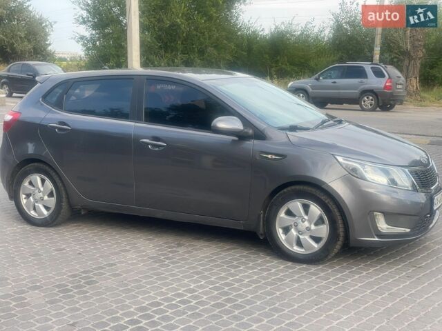 Сірий Кіа Ріо, об'ємом двигуна 1.4 л та пробігом 177 тис. км за 6770 $, фото 4 на Automoto.ua
