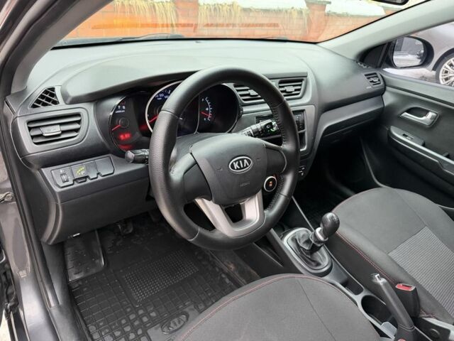 Сірий Кіа Ріо, об'ємом двигуна 1.4 л та пробігом 177 тис. км за 5450 $, фото 7 на Automoto.ua