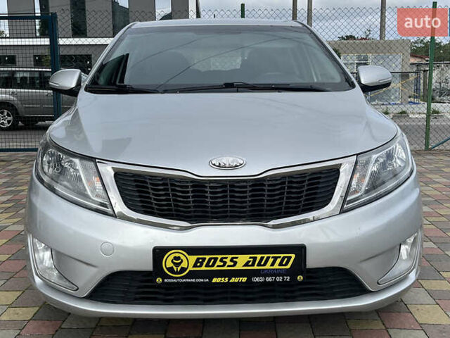 Серый Киа Рио, объемом двигателя 1.59 л и пробегом 218 тыс. км за 8500 $, фото 1 на Automoto.ua