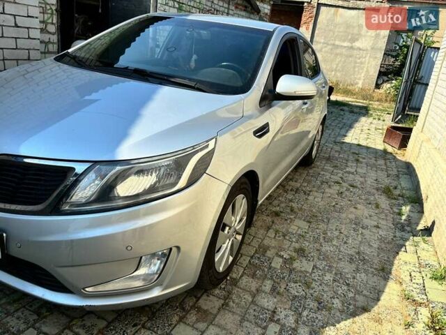 Серый Киа Рио, объемом двигателя 1.59 л и пробегом 145 тыс. км за 8800 $, фото 1 на Automoto.ua