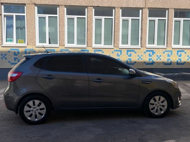 Серый Киа Рио, объемом двигателя 1.6 л и пробегом 160 тыс. км за 7792 $, фото 5 на Automoto.ua