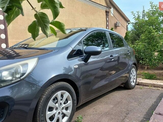 Серый Киа Рио, объемом двигателя 1.12 л и пробегом 198 тыс. км за 6500 $, фото 1 на Automoto.ua