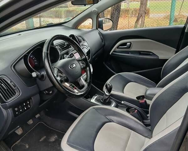 Серый Киа Рио, объемом двигателя 1.4 л и пробегом 191 тыс. км за 7799 $, фото 8 на Automoto.ua