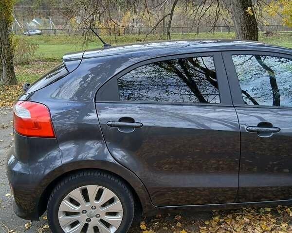 Серый Киа Рио, объемом двигателя 1.4 л и пробегом 191 тыс. км за 7799 $, фото 3 на Automoto.ua