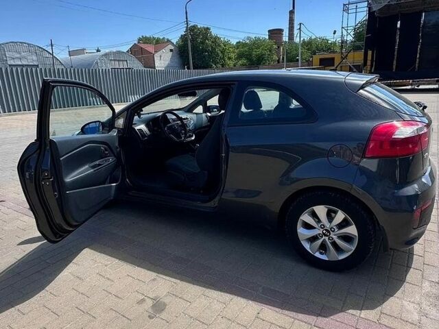 Серый Киа Рио, объемом двигателя 1.4 л и пробегом 125 тыс. км за 7900 $, фото 1 на Automoto.ua