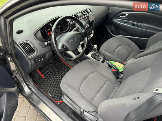 Серый Киа Рио, объемом двигателя 1.4 л и пробегом 85 тыс. км за 10999 $, фото 18 на Automoto.ua