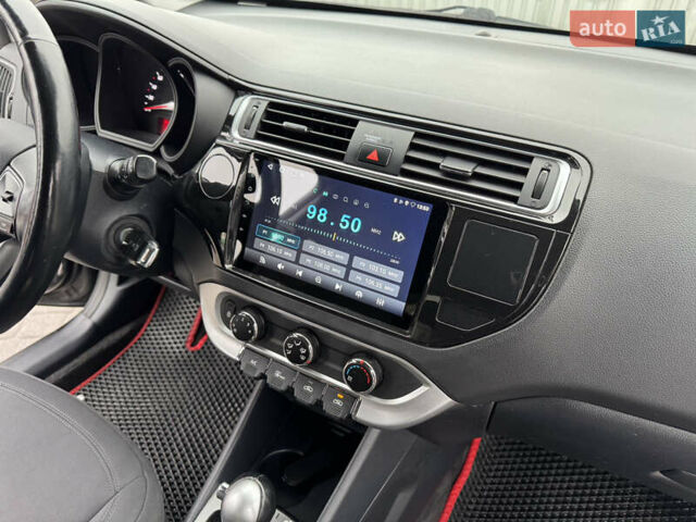 Серый Киа Рио, объемом двигателя 1.4 л и пробегом 85 тыс. км за 10999 $, фото 20 на Automoto.ua