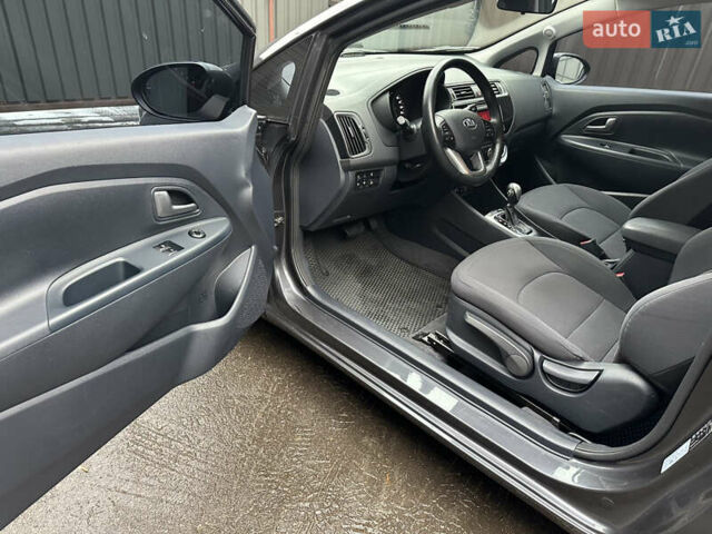 Серый Киа Рио, объемом двигателя 1.4 л и пробегом 56 тыс. км за 10800 $, фото 15 на Automoto.ua