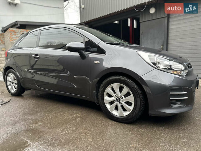 Серый Киа Рио, объемом двигателя 1.4 л и пробегом 56 тыс. км за 10800 $, фото 3 на Automoto.ua
