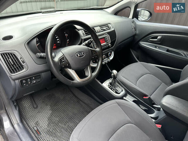 Серый Киа Рио, объемом двигателя 1.4 л и пробегом 56 тыс. км за 10800 $, фото 11 на Automoto.ua