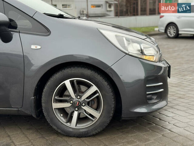 Серый Киа Рио, объемом двигателя 1.4 л и пробегом 85 тыс. км за 10999 $, фото 10 на Automoto.ua