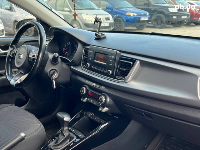 Сірий Кіа Ріо, об'ємом двигуна 1.4 л та пробігом 60 тис. км за 14890 $, фото 7 на Automoto.ua