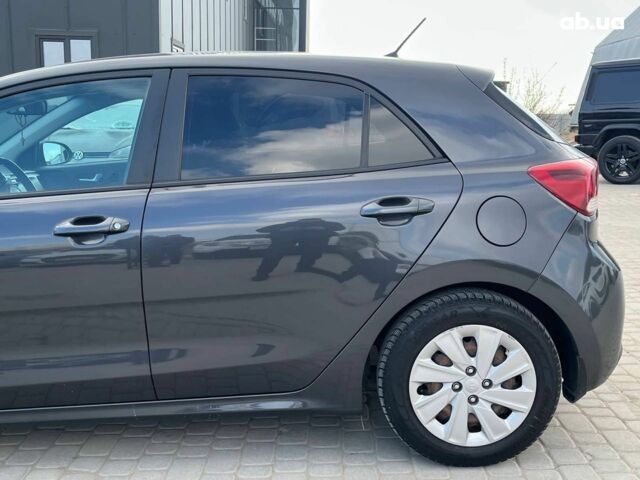 Сірий Кіа Ріо, об'ємом двигуна 1.4 л та пробігом 60 тис. км за 14890 $, фото 1 на Automoto.ua