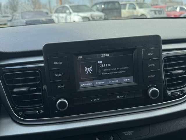 Серый Киа Рио, объемом двигателя 1.4 л и пробегом 75 тыс. км за 12000 $, фото 7 на Automoto.ua