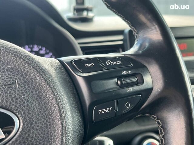 Сірий Кіа Ріо, об'ємом двигуна 1.4 л та пробігом 60 тис. км за 14890 $, фото 9 на Automoto.ua
