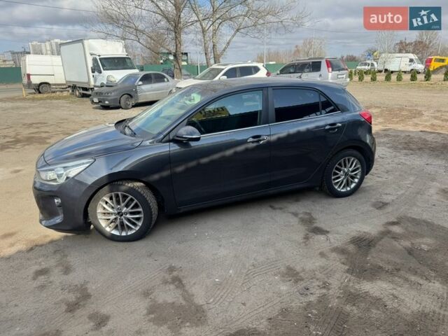 Серый Киа Рио, объемом двигателя 1.4 л и пробегом 75 тыс. км за 11999 $, фото 1 на Automoto.ua