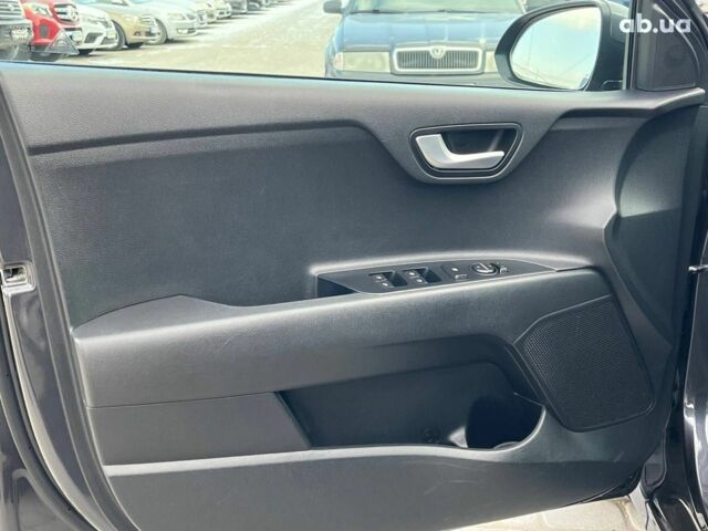 Сірий Кіа Ріо, об'ємом двигуна 1.4 л та пробігом 60 тис. км за 14890 $, фото 17 на Automoto.ua