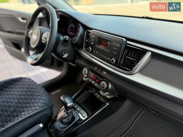 Серый Киа Рио, объемом двигателя 1.37 л и пробегом 64 тыс. км за 14000 $, фото 28 на Automoto.ua